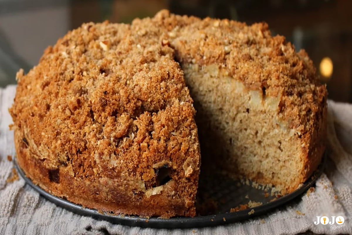 Applesauce coffee cake topped with a buttery streusel layer Applesauce coffee cake with crumbly streusel topping