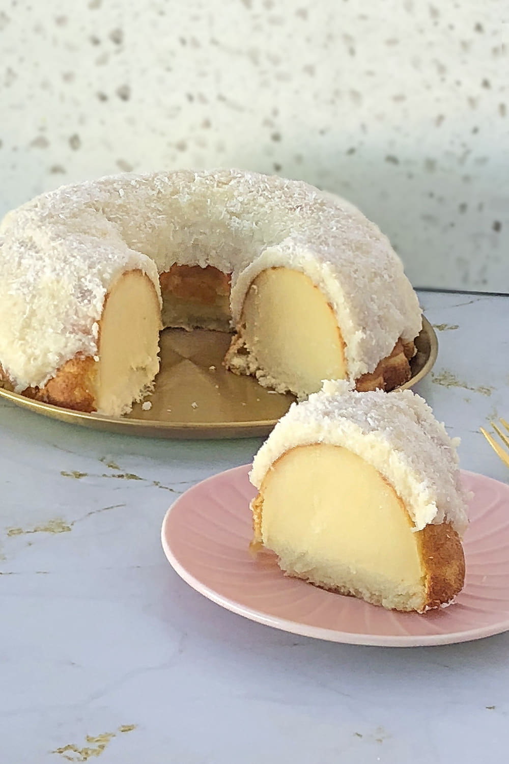Moist easy coconut cake with creamy coconut topping