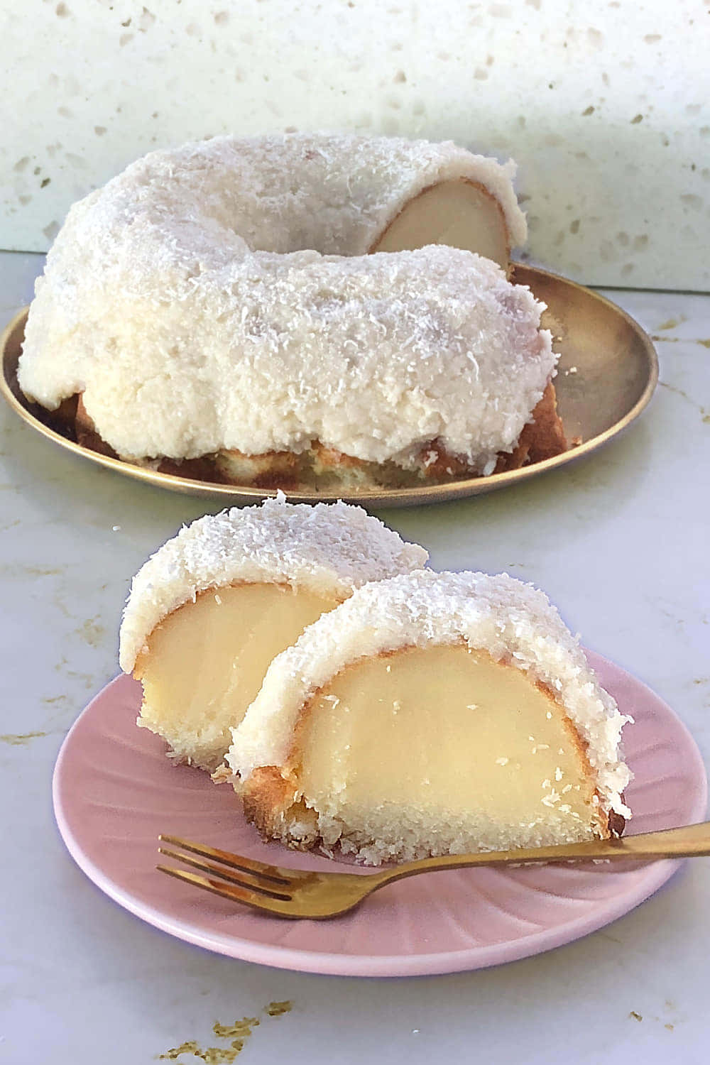 Moist easy coconut cake slice with creamy coconut topping and soft texture